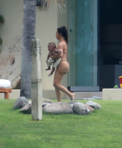 Kim Kardashian Shows Off Saint and North West With Bikini Body In New Photos | Celeb Dirty Laundry Kim Kardashian Pool Photoshoot, Kim Kardashian Swimsuit, Kim Kardashian Swimming Suit, Khloe Kardashian Swimsuit Bikinis, Kate Middleton News, Michelle Stafford, Jacqueline Macinnes Wood, Kim Kardashian Meme, Saint West