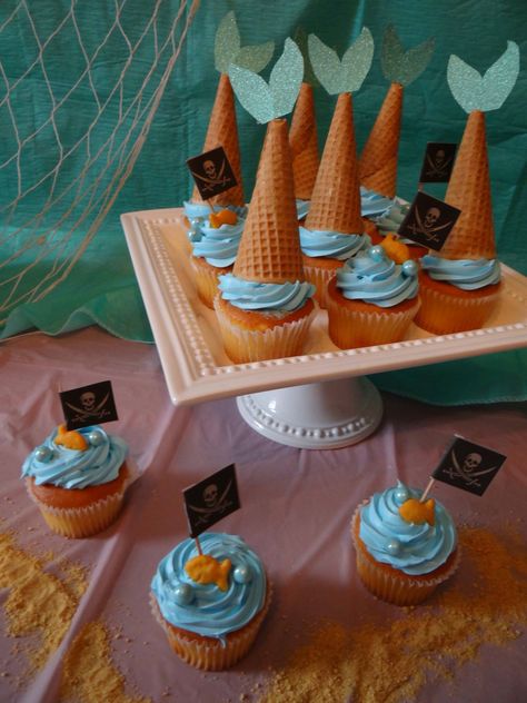 Mermaid and pirates cupcakes Pirate And Mermaid Gender Reveal Party, Mermaid And Pirate Cupcakes, Mermaid Or Fisherman Gender Reveal, Pirates And Mermaids Party, Mermaids And Pirates Party, Mermaid Or Pirate Gender Reveal, Mermaid Gender Reveal, Pirates Cupcakes, Pirates And Mermaids Birthday Party