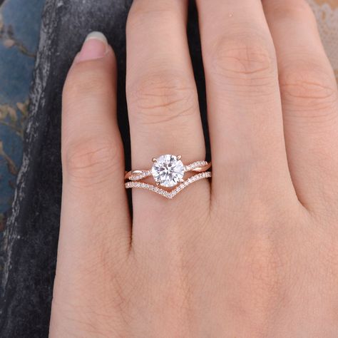 "Infinity Moissanite Bridal Set White Gold 7mm Round Cut Solitaire Moissanite Engagement Ring Rainbow Curved Chevron 2 Rings Set Diamond Link for the moissanite ring only: https://www.etsy.com/listing/654797976 Link for the matching band only: https://www.etsy.com/listing/747736985 ITEM INFORMATION Engagement Ring Metal Type - Solid 14k Rose Gold Band Width - (approx. 2.3mm) Center Stone - 7mm Natural Moissanite, Round Cut Side Stone - Natural Diamond,Clarity - SI, Color - H OR Moissanite, D col Twisted Band Engagement Ring, Pretty Engagement Rings, White Gold Bridal Set, Engagement Rings Twisted, Cute Engagement Rings, Round Halo Engagement Rings, Moissanite Bridal Sets, Future Engagement Rings, 2 Rings