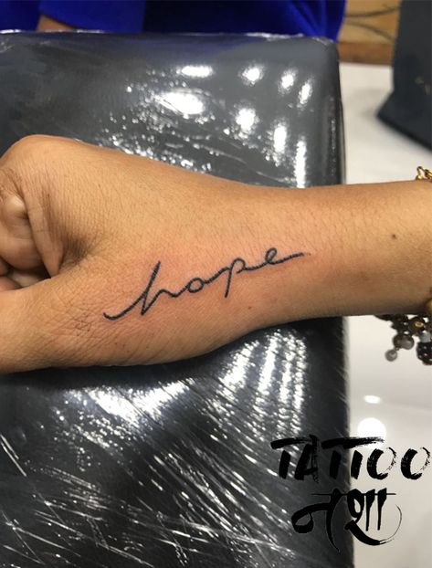 hope tattoo hope tattoo design small tattoo on hand hope tattoo on hand by anuag chouhan @tattoo nasha Tattoo Ideas Female Hope, Hope Hand Tattoo, Small Tattoo On Hand, Hope Tattoos For Women, Hope Tattoo Designs, Hope Tattoo Ideas, Piercings Cute, Round Tattoo, Hope Tattoo