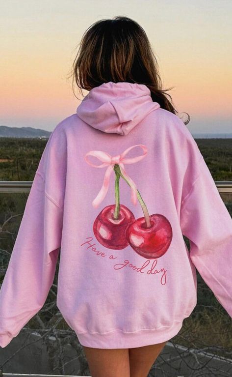 Embrace the charm of the Coquette Cherry Hoodie, a delightful piece that combines style and comfort. Featuring a cheerful "Have A Good Day" message on the back, this pullover exudes positivity. The addition of a bow accent adds a trendy touch, making it a must-have for those who love a cute and fashionable look. Perfect for any casual outing, this hoodie is available on Etsy. Cute Hooded Hoodie For Fall, Cute Winter Hoodie With Pockets, Cute Hoodie With Pockets For Winter, Cute Winter Hoodie With Kangaroo Pocket, Cute Long Sleeve Hoodie With Kangaroo Pocket, Cute Hooded Hoodie For Loungewear, Cute Hoodie With Drawstring Hood For Fall, Cute Fall Hoodie With Drawstring Hood, Cute Long Sleeve Hoodie For Loungewear