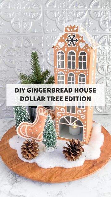 Lindy Blake | Maker | Designer on Instagram: "Let's hop on the DIY Pottery Barn Gingerbread House bandwagon with this Dollar Tree DIY!! This is a $5 dupe!! This Christmas DIY is great for a kiddo's craft night or with friends! It turns out so gorgeous you could even gift! The best part of this DIY? It doesn't have to be perfect! Have fun and make yourself a Gingerbread village for a fraction of the cost! Materials: Dollar Tree Metal House Golden Brown Craftsmart Acrylic Paint Tulip White puff paint with precision tip Paint Brush and time The Process: Paint 3 coats of brown each side. Puff Paint each side one at a time and let dry before painting the next side to avoid drama, tears, and mess up. I took my time over 3 days. If you set in sun though, the paint will dry way quicker be Barn Gingerbread House, Diy Puffs, Tulip White, Ginger Bread House Diy, Gingerbread Diy, December Crafts, Gingerbread Village, Metal House, Puff Paint