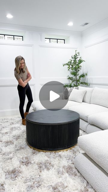 Lauren Jansen | DIY on Instagram: "DIY Storage Coffee Table! I found some similar coffee tables online that I loved… but I didn’t love the price points. So I decided to build one myself! I stacked 2 24” round edge glued panels on each other, nailed and glued them together. Then added a 36” round on top! Next, I cut down 28 6’ long, 3/4” wide dowel rods to 14”. I used hot wood glue to glue them on (making sure each was level). I used 140 total 14” dowel pieces 😳. I got wood glued them on the bottoms and sides and am shocked at how strong this glue is! I did end up flipping it upside down and adding nails through the bottom for extra stability. Next, I added a few supports inside the table and glued stoppers to the back of another 36” round. This will be my removable top! I caulked betwe Fluted Coffee Table Diy, Diy Round Coffee Table With Storage, Convertable Furniture, Diy Storage Coffee Table, Diy Round Coffee Table, Round Coffee Table Diy, Coffee Table With Seating, Convertible Coffee Table, Pole Wrap