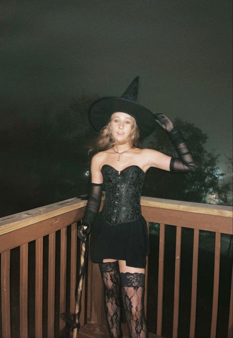 witch costume, halloween, spooky, black corset, black mini skirt, witch hat, broom, sexy, lace, nighttime Witch Costumes Corset, Witch Accessories Costume, Alternative Witch Costume, Witch Costume With Corset, Diy Halloween Witch Costumes, Witch Costume College, Witch Costumes For Women Aesthetic, Witch Outfit Black, Corset Witch Costume