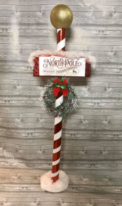 Diy Card Board Christmas Decorations, North Pole Porch Decor, Diy North Pole, Diy North Pole Decoration, Diy North Pole Post, North Pole Sign Diy, Santa North Pole Decor, North Pole Christmas Decor, Candy Cane Out Door