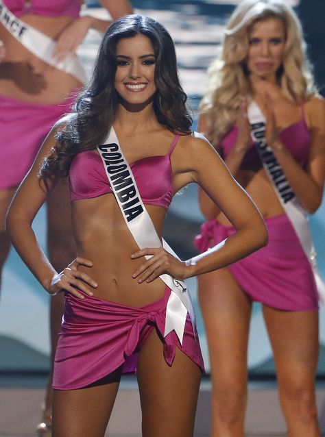 Paulina Vega Miss Universe 2015 swimsuit competition purple smile brunette pageant Miss Colombia 2014 Vegas Swimsuits, Miss Jamaica, Miss Teen Universe, Miss Universe 2014, Miss Colombia, Miss Universe 2015, Miss Teen, Miss Usa, Miss Universe