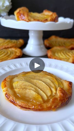 580K views · 27K reactions | Tarte Fine aux Pommes Recipe 🤍

Immerse yourself in the world of French patisserie with this simple and delightful recipe for Tarte Fine aux Pommes 🥰

📝  Ingredients:

- 1 sheet puff pastry
- 2 large apples (Braeburn or Boskoop)
- Apricot jam
- 1 tbsp lemon juice
- 2 tbsp brown sugar
- 1 tsp cinnamon
- ⁠1 egg yolk

🤍  Preparation:

1. Preheat the oven to 200°C (392°F) and line a baking sheet with parchment paper.

2. Peel, core, and thinly slice the apples. Drizzle with lemon juice to prevent browning.

3. Roll out the puff pastry sheet on a lightly floured surface and cut out 7-8 circles or squares.

4. Place the puff pastry circles on the prepared baking sheet.

5. Gently heat the apricot jam to make it more spreadable. Brush a thin layer of the warmed ja Maple Pie, Puff Pastry Recipes Dessert, French Apple Tart, Food Reels, Pastries Recipes Dessert, Apple Puff Pastry, Puff Pastry Desserts, Afternoon Tea Recipes, Tarte Fine