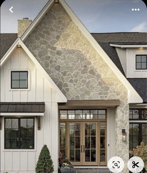 Brick Stone Board And Batten Exterior, Large Windows Front Of House, Asphalt And Metal Roof Combo, White Sided House Exterior, Dark Siding Light Stone Exterior, White House With Stone Accents Exterior, Houses With Board And Batten Siding, Clay Windows Exterior, Long Ranch House Exterior