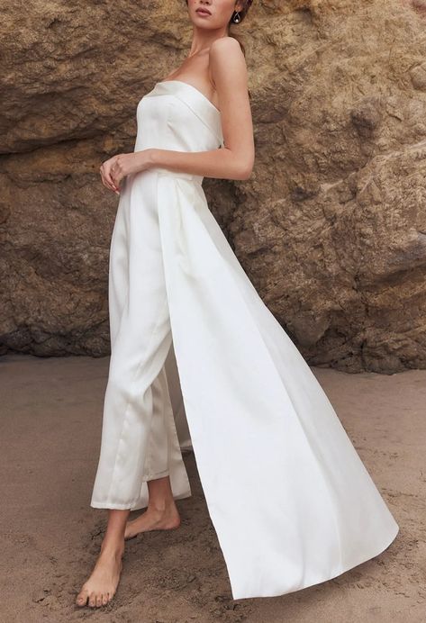 23 Best Bridal Jumpsuits for Nontraditional Ceremonies (and Brides!) A flawless option for your offbeat nuptials. April 12, 2023 Jumpsuit With Overskirt, Bridal Pantsuit, Wedding Rehearsal Dress, Bride Jumpsuit, Rehearsal Dinner Outfits, Queer Weddings, Classic Bride, Prom Inspo, Rehearsal Dinner Dresses