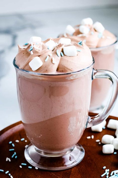 Only three simple ingredients in this delicious Whipped Hot Chocolate! Mix up your hot chocolate recipe by making this easy and delicious whipped version. Plus, it only takes a few minutes to make! Whipped Hot Chocolate Recipe, Whipped Hot Chocolate, Warm Drinks Recipes, Hot Chocolate And Marshmallows, Pumpkin Hot Chocolate, Homemade Hot Chocolate Mix, Drink Garnishing, Hot Chocolate Coffee, Hot Chocolate Recipe