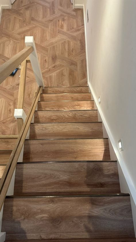 Discover the artistry: decorative tile pattern meets traditional stair. Neat bronze nosing complements the smoked Oak tone, creating a visual feast on this tough, resilient surface. 🎨✨ Stairs Trim, Vinyl Tiles, Luxury Vinyl Tile, Wood Stone, Luxury Vinyl, Porcelain Ceramics, Beautiful Space, Floor Cleaner, Vinyl Flooring