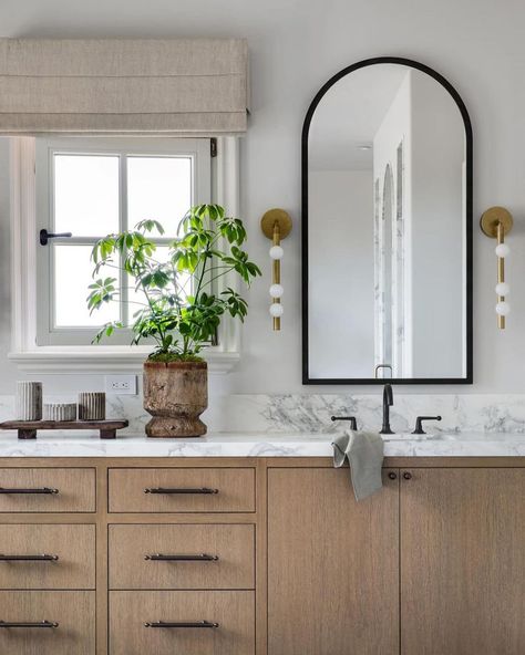 Bathroom Design | Design by Brooke Wagner Designs | Modern Bathroom with bathroom vanity and gold sconces, and a marble sink Arched Hallway, Mcgee Bathroom, Black Arch Mirror, Lake Bathroom, Brooke Wagner Design, Brooke Wagner, Condo Bathroom, Mixing Metals, Newport Coast