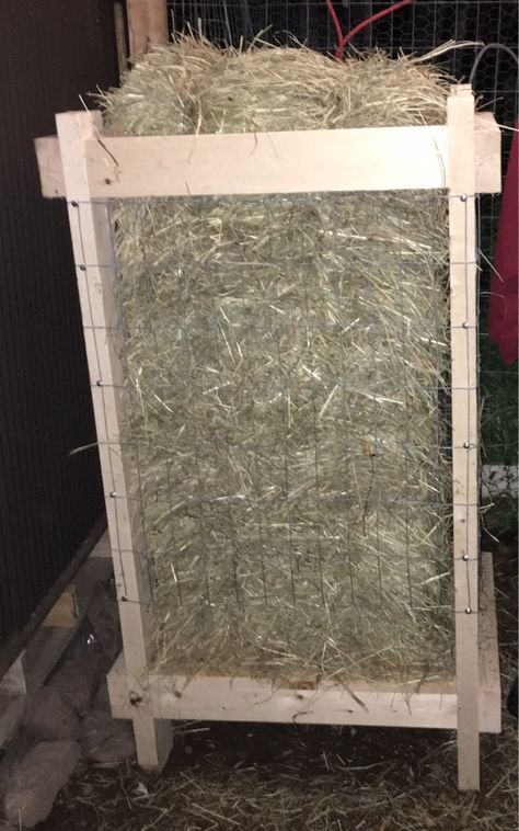 Hay bale feeder for goats. No peeing on their food anymore. Fits a full bale. Inside dimension 18"x 24". Bottom shelf is 6" off ground. Goat Feeders Ideas Hay, Square Bale Hay Feeder, Goat Hay Feeder, Hay Feeder For Horses, Goat Feeder, Hay Rack, Goat Shelter, Goat Pen, Horse Farm Ideas