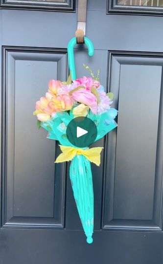 901K views · 24K reactions | she turned an umbrella into a spring wreath | she turned an umbrella into a spring wreath

this diy arts & crafts video shows how to turn an ordinary umbrella into a beautiful wreath for spring and... | By Brooklyn B | With a beautiful umbrella for
spring and here's what you do. You're going to loosen it a
little bit and plant it right between your legs like that.
Now, I have some gorgeous spring flowers and you take
your flowers and put them right in between these little holes
just like this. I have a nice, gorgeous pink bouquet Like
this. Gonna put these on the side here. You want to do
north, south, east, west here buns. I think they match the
umbrella. They look really cute, okay? Alright, so this is
what you're looking for and now here's what's going to ha Small Umbrella Decorations, Umbrella Door Decoration, Umbrella Craft Ideas, Umbrella Flower Arrangement, Flower Parasol, Mesh Decorations, Spring Wreaths For Front Door Diy, Umbrella Wreath, Polka Dot Umbrella