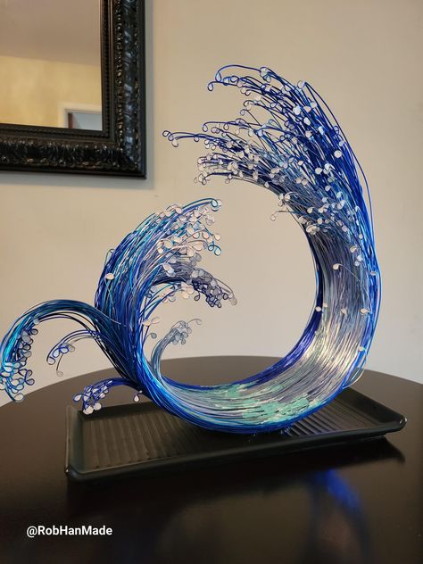 Hand made ocean wave sculpture made with colored aluminum wires. **Please message me regarding this art piece. It is On Hold for client.** Ocean Sculpture, Fish Tails, Wave Sculpture, Agate Wedding Ring, Water Sculpture, Wire Art Sculpture, Agate Wedding, Wire Wrapped Jewelry Tutorials, Art And Craft Videos