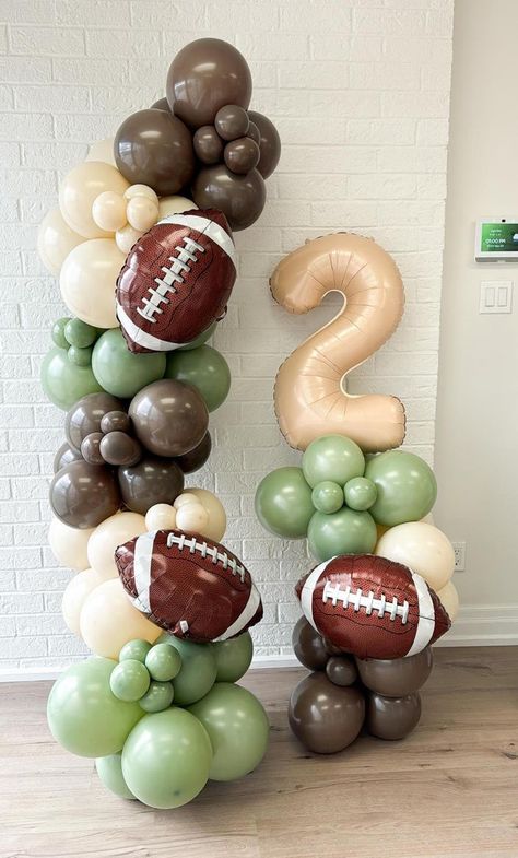 Ultimate Super Bowl Party Ideas for Families: Food, Games, and Decor - Parenting Kids and Teens Football Birthday Party Balloons, Second Down Birthday Football, Sports Themed First Birthday, Sports Baby Shower Theme For Boys, Sports First Birthday Party, Sports Birthday Party Boys, Football Balloon Arch, Football Birthday Party Theme, Boy Balloon Garland