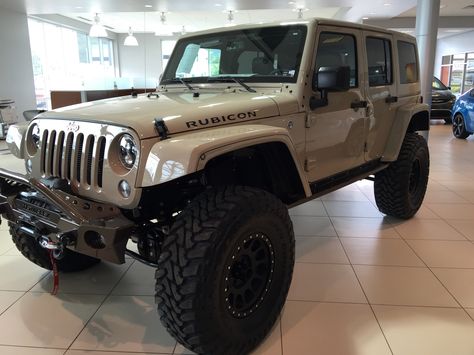 2016 Wrangler JK Rubicon tan lifted at the dealership Jeep Wrangler Tan, Tan Jeep Wrangler, Tan Jeep, Jeep Wrangler Girl, Lifted Jeeps, Jeep Wrangler Lifted, Badass Jeep, 2015 Jeep Renegade, Wrangler Accessories