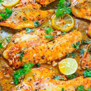 Spicy Lemon Garlic Baked Tilapia Recipe - Whisk Affair Oven Baked Tilapia, Baked Tilapia Recipes, Garlic Baked, Tilapia Recipe, Crusted Tilapia, Cholesterol Recipes, Baked Tilapia, Tilapia Recipes, Fish Recipes Healthy