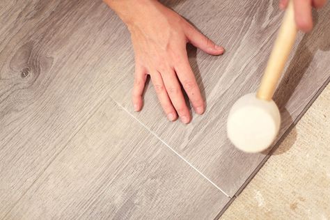 A person installing click lock vinyl flooring over a plywood subfloor. Vinyl Wood Plank Flooring, How To Install Vinyl Plank Flooring, Installing Vinyl Plank Flooring, Click Lock Flooring, Plywood Subfloor, Click Flooring, Vinyl Wood, Diy Shiplap, Wood Plastic Composite