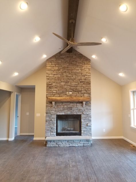 Stone Fireplace with vaulted ceiling and wood beam Fireplace With Beam Ceiling, One Beam Vaulted Ceiling, Beam In Vaulted Ceiling, Stone Fireplace Vaulted Ceiling Wood Beams, Vaulted Ceiling With One Center Beam, One Wood Beam On Ceiling Living Room, Stone Vaulted Fireplace, Fireplace Mantle Vaulted Ceiling, Wood Beam On Vaulted Ceiling