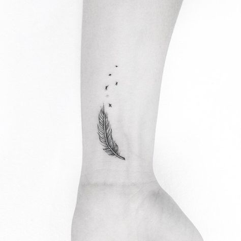 Feather Tattoo Ear, Feather Tattoo Wrist, Small Feather Tattoo, Tattoo Feather, Feather With Birds Tattoo, Tiny Bird Tattoos, Bird Tattoo Wrist, Feather Tattoo Design, Small Wrist Tattoos