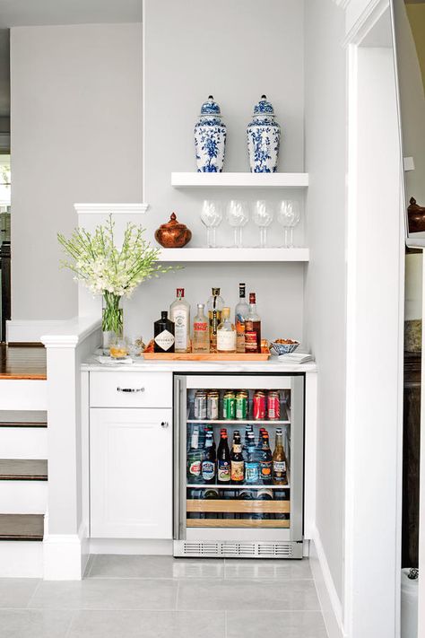 Take Advantage of Nooks and Crannies - 50 Best Small Space Decorating Tricks We Learned in 2016 - Southernliving. In a small area, no corner should go to waste. This nook offers an efficient use of space by adding a refrigerator for drinks, shelving for storing glasses, and a marble-topped counter to corral a small bar and mix up cocktails. It adds party and prep space to a small kitchen. Bar Nook, Bar Mini, Bar Sala, Cheap Ideas, Home Coffee Bar, Home Bar Designs, Mini Bars, Wet Bars, Design Seeds