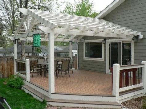 Two-toned composite decking ground-level deck with painted beetle kill pine pergola. Description from pinterest.com. I searched for this on bing.com/images Pitched Pergola, Deck And Pergola, Pergola Cost, Deck Pergola, Small Pergola, Cheap Pergola, Composite Deck, Plans Architecture, Pergola Attached To House