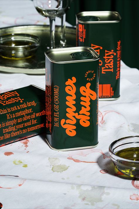 Giovanni Stillittano of Auge Design channeled the druggy, debaucherous '80s in his packaging, with bubbly typography that switches between elegantly wasted cursive to a more serious, old-fashioned serif. A warm, nostalgic color palette makes the sunny orange text pop against forest green like the pit in an olive. 80s Packaging Design, Condiment Packaging Design, Vintage Package Design, Italian Packaging Design, Spice Packaging Design Ideas, Glass Bottle Packaging Design, 90s Packaging, Packaging Color Palette, Green Packaging Design