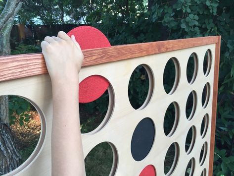 Cool dad made a giant Connect Four board and you can, too | Mashable Connect Four Game, Giant Connect Four, Kids Yard, Diy Yard Games, Connect Four, Cork Trivet, Family Party Games, Garden Games, Woodworking Toys