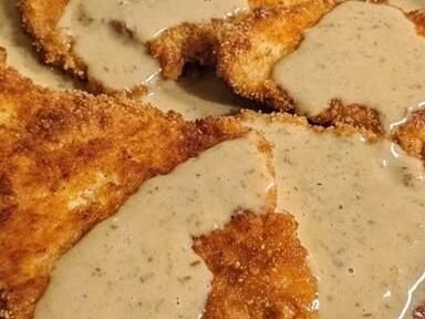 Crispy Pork Schnitzel with Creamy Dijon Gravy: A Flavorful Feast - NewsBreak Pork Schnitzel With Dijon Gravy, Crispy Pork Schnitzel, Pork Snitzel, Dijon Gravy, Creamy Dijon, Bbq Pulled Pork Sandwiches, Guinness Beef Stew, Tender Pork Chops, Roasted Chicken And Potatoes