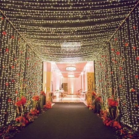 Fairy Lights Wedding Decorations, Indian Wedding Decorations Receptions, Reception Stage Decor, Fairy Lights Wedding, Gate Decoration, Wedding Reception Backdrop, Wedding Background Decoration, Wedding Entrance Decor, Lights Wedding Decor