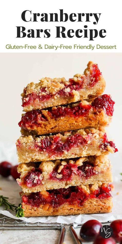 Cranberry Bars - Enjoy fresh cranberry bars complete with a tart cranberry filling and zesty flavors all on top of a semi sweet, buttery rolled oat crust. This is sure to be one of your new favorite holiday desserts! These cranberry crumble bars are the perfect festive addition to your next holiday party or Christmas dessert spread. This recipe is dairy-free and gluten-free friendly. Gluten Free Apple Bars Recipes, Gluten Free Oat Desserts, Gluten Free Cranberry Bars, Vegan Cranberry Dessert Recipes, Low Fodmap Christmas Desserts, Christmas Desserts Non Dairy, Cranberry Coconut Bars, Cranberry Gluten Free Recipes, What To Make With Whole Cranberries