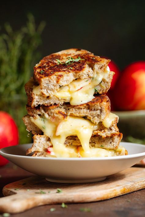 This Apple Brie Grilled Cheese is crispy, extra cheesy, savory, and a little sweet! Brie cheese melts more than most cheeses which makes this sandwich extra special and just melt-in-your-mouth delicious! It's very simple, easy to make, and the combination of apple and thyme makes this the perfect lunch or dinner for fall and winter. This grilled cheese never disappoints! Apple Brie Grilled Cheese Sandwich, Fall Grilled Cheese, Brie Grilled Cheese, Fall Grilling, Thyme Simple Syrup, Apple Brie, Recipes Meatless, Mint Simple Syrup, Breakfast Appetizers