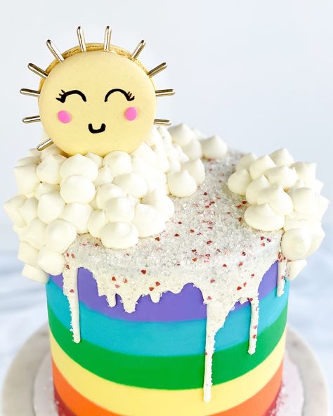 Rainbows, fluffy buttercream clouds and a macaron sun make this the happiest cake! Buttercream Clouds, Rainbow Kids Party, Fluffy Buttercream, Sun Cake, Sunshine Birthday Parties, Sunshine Cake, Cloud Cake, Cupcakes For Boys, Rainbow Birthday Cake