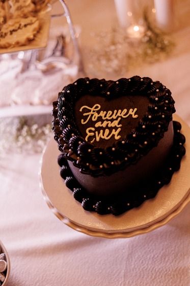 Black Buttercream cake that reads 'Forever and Ever' in white lettering with white edible pearls all around. Emo Engagement Party, Black White Engagement Party, Black Buttercream Cake, Black Engagement Party, Black Buttercream, White Engagement Party, Wrapped Dates, Engagement Party Cake, Bridal Cake