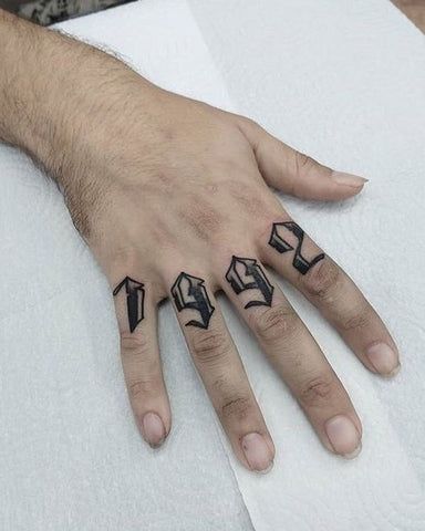 Finger Tattoo Ideas for Men Meaningful Finger Tattoos, Finger Letter Tattoos, Best Finger Tattoos, Finger Tattoos For Men, Men Finger Tattoos, Simple Hand Tattoos, Minimalistic Tattoo, Knuckle Tattoos, 13 Tattoos