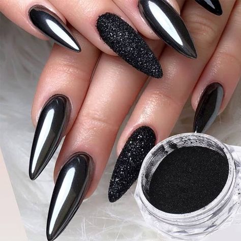 This dramatic nail design features a unique combination of textures, mixing a glossy chrome finish with matte black accents. The stiletto shape enhances the boldness, while the textured black nail adds depth and dimension to the overall look. . Ideal for parties, events, or simply making a statement, these nails offer a high-contrast, high-impact style that exudes confidence and creativity. Chrome Nails Ideas, Almond French Tips, Cross Nail Designs, Matte Stiletto Nails, Black Chrome Nails, Ombre Chrome Nails, Metallic Nail Art, Cross Nails, Mens Nails