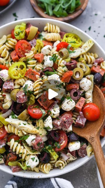 Caitlin | Easy & Healthy Meals on Instagram: "ITALIAN ANTIPASTO PASTA SALAD!😍
.
It’s the beginning of pasta salad season over here & I’m getting soo excited!🤗 Hearty meats, lots of veggies, fresh mozzarella & sliced basil & a zesty Italian vinaigrette to tie it all together!😍 This baby’s a winner!
.
Hope you’re all having the best Friday loves!😊💕 (And have a super fun Super Bowl weekend!)
.
Italian Antipasto Pasta Salad🍅
Rotini pasta
Salami
Pepperoni
Canned artichokes
Cherry tomatoes
Olives (kalamata & green)
Pepperoncini
Mozzarella balls
Red onion
Fresh basil
Zesty Italian Vinaigrette: 1/2 cup olive oil + 1/4 cup red wine vinegar + 2 garlic cloves, minced + 1 Tbsp Italian seasoning + 1/4 tsp red pepper flakes + salt & pepper, to taste
.
(Full recipe is linked in my “Recipes🍴” highl Canned Artichokes, Antipasto Pasta Salad, Antipasto Pasta, Italian Vinaigrette, Olives Kalamata, Antipasto Pasta Salads, Italian Antipasto, Cheap Family Meals, Super Bowl Weekend