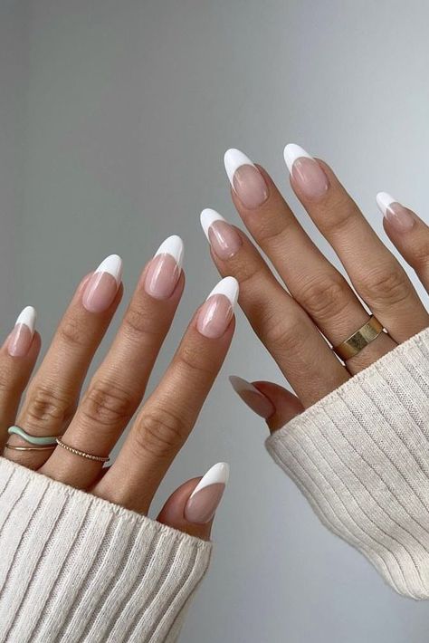 Aesthetic Almond Nails, Aesthetic Almond Nails, almond nail ideas, classy nail ideas, minimal nail ideas, chic nails, almond nails, short almond nails, long almond nails, french tip nails, french manicure French Polish Acrylic Nails, French Polish Almond Nails, Almond White Tips Nails, White French Acrylic Nails Almond, Nails Acrylic Oval French Tip, White Nails With Designs Oval, White Design French Tip Nails, Acrylics French Tip Almond, Oval White Tip Nails With Design