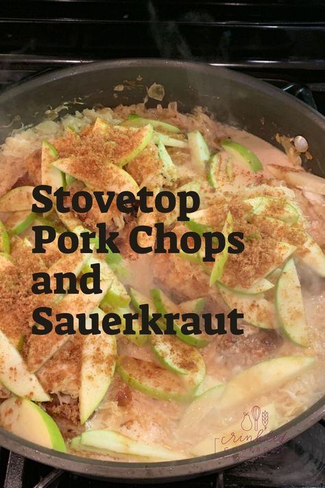 Pork chops and sliced apples in a skillet on the stove. Pork And Sauerkraut Stovetop, Pork Chops And Sauerkraut Recipes, Pork Chops And Sauerkraut Skillet, Pork Chop And Sauerkraut Recipes, Stovetop Pork Chops, German Pork Chops, Stove Top Pork Chops, Pork Chops With Sauerkraut, Sauerkraut And Apples