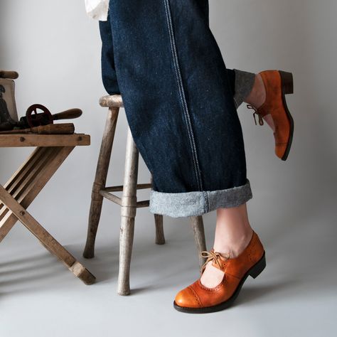 It's the season for Mary Janes! We love our blood orange 1930's Mary Janes. They are so versatile, and a great pop of colour for Spring! To celebrate the arrival of spring, get 10% off this week on our Mary Janes in stock! 🛒 Use discount code SPRINGMARYJANE10 at checkout on Jobearboots.com and on our Etsy shop. #timelessstyle #1930s #handmadeshoes #slowfashion #shoegasm #vintagestyle #buylessbuybetter #madetoorder #ethicallyproduced #vintageshoes #1940sstyle #maryjaneshoes #smallbui... Ww2 Women, Women's Lace Up Boots, Small B, Victorian Women, The Arrival, Aging Beautifully, 1940s Fashion, Tall Women, Blood Orange