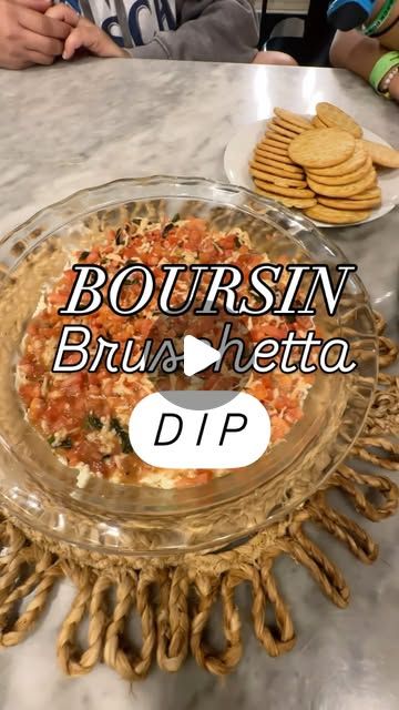 Cara Carroll on Instagram: "✨ Boursin Bruschetta Dip ✨
Not my original recipe. This one’s an oldie, but a goodie! No exact measurements here - just measure with your heart 🫶🏼❤️

You’ll need
✨ Two packages of Boursin cheese (I used shallot + chive )
✨ 3 Roma tomatoes, chopped
✨ fresh basil, chopped
✨ minced garlic 
✨ fresh cracked black pepper
✨ sea salt
✨ Olive oil
✨ Balsamic glaze
✨ shredded Parmesan cheese
✨ shredded mozzarella cheese

Spread Boursin evenly into bottom of a pie dish. Mix together all other ingredients and bake at 350 for 10-15 minutes or until the cheese is a little gooey. Use a slotted spoon to transfer mix evenly over Boursin. Serve with pita chips, butter crackers, crusty French bread, or crostinis. 

Send this to a friend you’d like to share this with and save for How To Serve Boursin Cheese, Boursin Bruschetta, Boursin Cheese Appetizers, Boursin Appetizers, Cheese Chip Dip, Bruschetta Dip, Boursin Cheese Recipes, Crusty French Bread, Chives Recipe