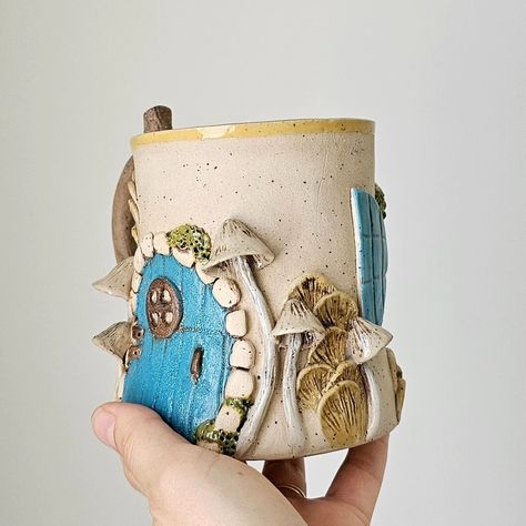 Fairy Door Mug, Hobbit House Mug, Handmade Stoneware Fantastic Mug, Mystical Gifts, One of a Kind Gift, Ceramic Beer Mug, Ceramic Mug #fairydoor #hobbithousemug #hobbithouse #handmadestonewareceramics #uniquegift #ceramicbeermug #ceramicmug #fairyhouse #cottagecore #cottagecoremug #fairymug #mushroommug #hobbitmug #handmadecoffeemug #fairyhousemug Mystical Gifts, House Mug, Hobbit House, Mug Handmade, Fairy Door, Stoneware Ceramics, Mug Ceramic, Fairy House, The Hobbit