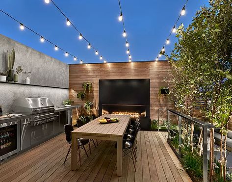 Contemporary Deck, Fireplace Outdoor, Black Chairs, Linear Fireplace, Rooftop Terrace Design, Built In Bbq, Lights Hanging, Bbq Ideas, Outdoor Kitchen Design Layout