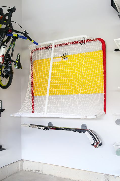 Organizing a garage can feel like a daunting task, but when you have the best storage systems working for you, it doesn't have to be difficult at all! I've rounded up my favorite storage systems for organizing a garage so your next garage project can be an easy one! | #garage #garageorganization #organizedgarage #garagestorage #organization #organized #organizing #organize #hockey #hockeystorage Hockey Equipment Storage, Hockey Room, Hockey Gear, Garage Organization Diy, Garage Remodel, Equipment Storage, Storage Systems, Garage Storage Organization, Vertical Storage