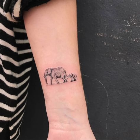 90 Magnificent Elephant Tattoo Designs | TattooAdore Mom Daughter Tattoos Elephant, 2 Elephant Tattoos, Elephant Tattoos Mom And Baby, Elephant With Baby Tattoo, Elephant Tattoos Mother Daughter, 2 Elephants Tattoo, Mom Elephant Tattoo, Mama Elephant Tattoo, Mother And Baby Elephant Tattoo