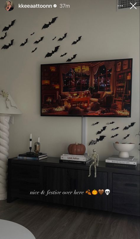 Halloween Decor For Entertainment Center, Outdoor Simple Halloween Decor, Halloween Home Decor Living Room, Halloween Entertainment Center, Halloween Couch Decor, Halloween Entertainment Center Decor, Black And Orange Living Room, Inside Halloween Decorations, Bats Decoration