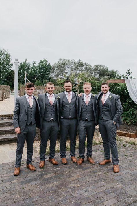 Charcoal Gray Suit Groomsmen, Dark Gray Suit With Pink Tie, Gray And Pink Groomsmen Attire, Grey And Pink Wedding Suit, Grey Suit For Groomsmen, Groomsmen Attire For Dusty Rose Wedding, Grey Suit With Dusty Rose Tie, Pink And Dark Grey Wedding, Wedding Colors With Grey Suits