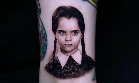 The best, most original and unique Wednesday Addams tattoos from some of the best artists from around the world. Wednesday Tattoo, Wednesday Addams Tattoo, Diy Tattoo Permanent, Charles Addams, Geometric Tattoo Design, Initial Tattoo, Gaming Tattoo, Inked Magazine, Cartoons Series