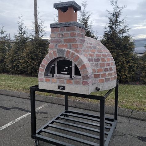 On Sale!!! Check out these super snazzy pizza ovens! Have the traditional wood fired cooking experience with an innovative, modern style. There is limited stock on these ovens so order now before you have to wait! www.fireflypizzaovens.com #proforno #modern #modernhome #modernfarmhouse #modernarchitecture #outdoorkitchen #pizzaovencooking #outdoorkitchenideas #outdoorkitchendesign #eatinghealthier #woodburning #firefeature #authentic #luxuryhome #pizzaovens #portableoven #outdooroven #cu... Woodfired Pizza Oven, Brick Pizza Oven Outdoor, Pizza Oven Outdoor Kitchen, Outside Grill, Wood Fired Cooking, Diy Pizza Oven, Brick Oven Pizza, Brick Pizza Oven, Wood Burning Oven